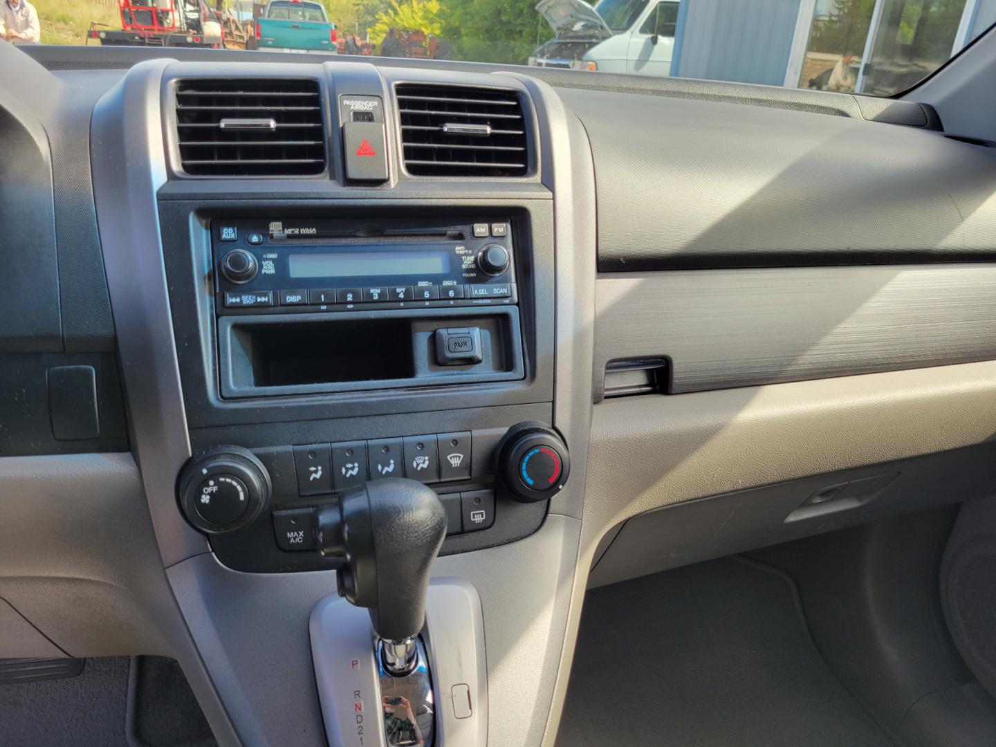 2009 Red /Gray Honda CR-V LX (5J6RE483X9L) with an 2.4L L4 engine, 5 Speed Automatic transmission, located at 450 N Russell, Missoula, MT, 59801, (406) 543-6600, 46.874496, -114.017433 - Great Running AWD SUV. 2.4L I4 Engine. 5 Speed Automatic Transmission. Air. Cruise. Tilt. Power Windows and Locks. New Tires. Roof Rack. Does have a Rebuilt Title so financing is not available. - Photo#14